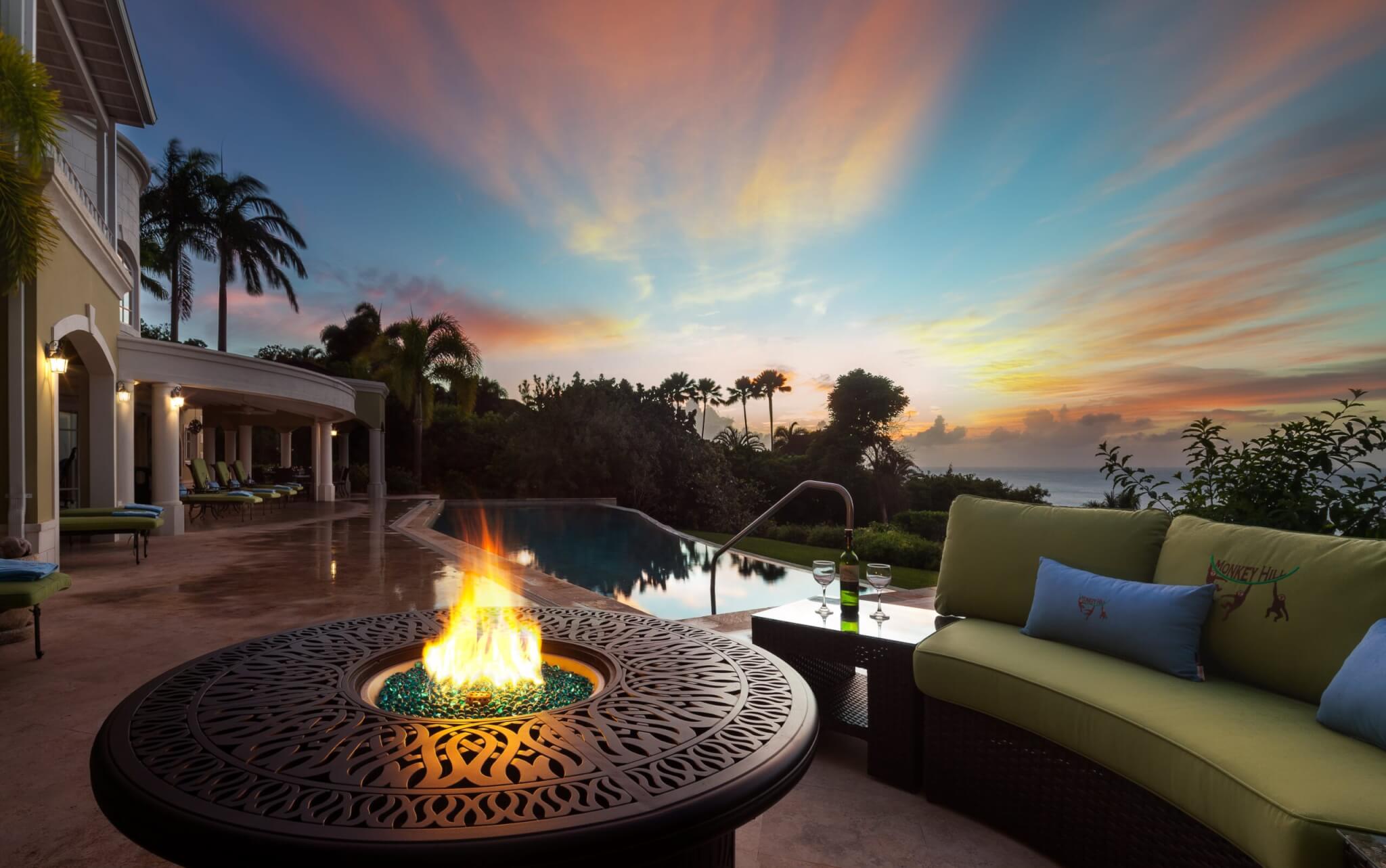 Monkey Hill at Sugar Hill outdoor lounge with fire coming out of table