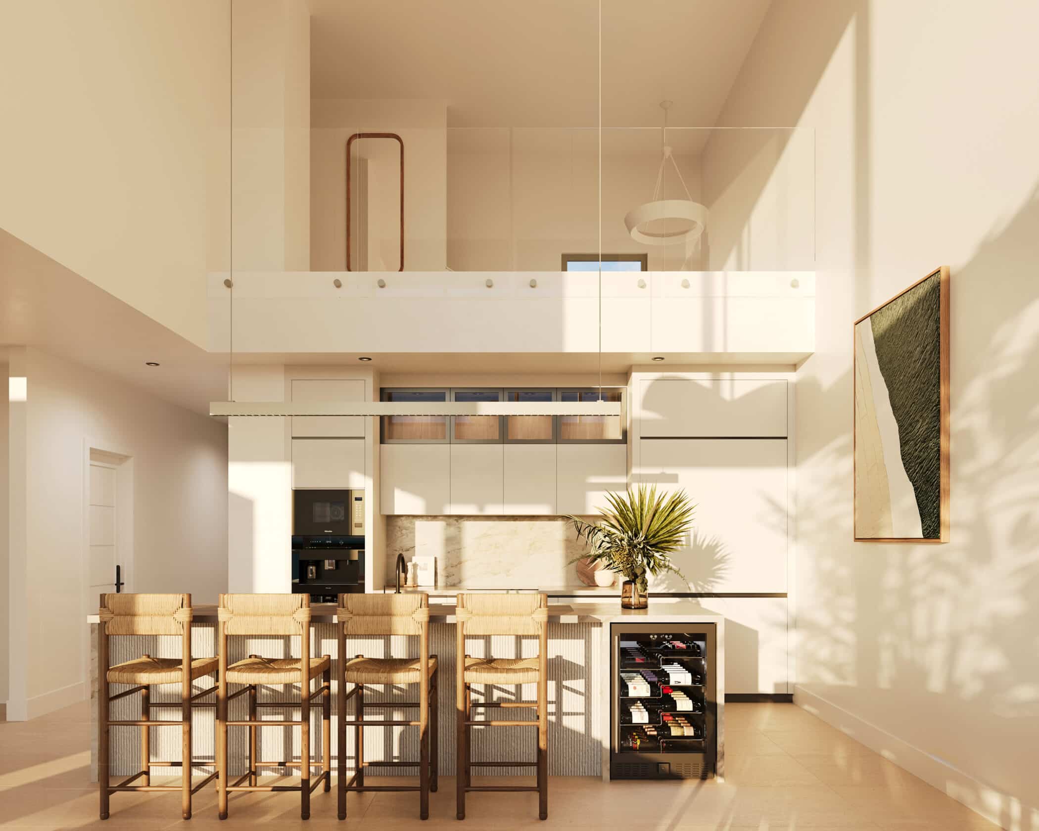 Modern kitchen with a tall ceiling, four wicker bar stools at an island, built-in appliances, a wine fridge, a potted plant on the counter, abstract wall art, and a loft area above with glass railing. Sunlight fills the space.